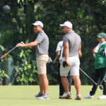 alido pointing direction to putt in hole 5
