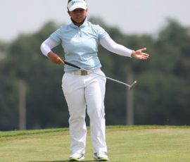 harmie constantino ready to putt in hole 6