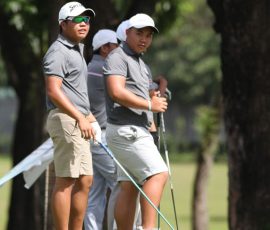 ira alido and paolo wong in hole 12