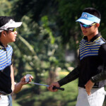 ira alido(left) and aidric chan after bunker shots in hole  4