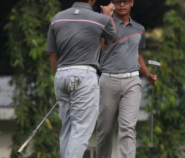 jolo make a fist with his plate mate jonas after a berdie