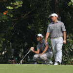 jolo study his line while brother jonas assisting in hole 3