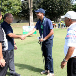 mr.martin lorenzo,president ,ngap_ shakes hands and welcoming mr jin-woo kim-rules manager of The R&A,asia-pacific.looking in are NGAP officialsJPG copy