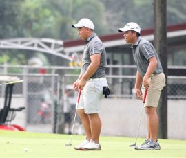 wong and alido in hole 4 green