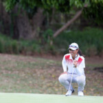 yuka saso relax and confident while study his line in hole 1